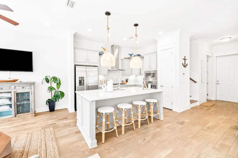 Large island in gourmet kitchen.