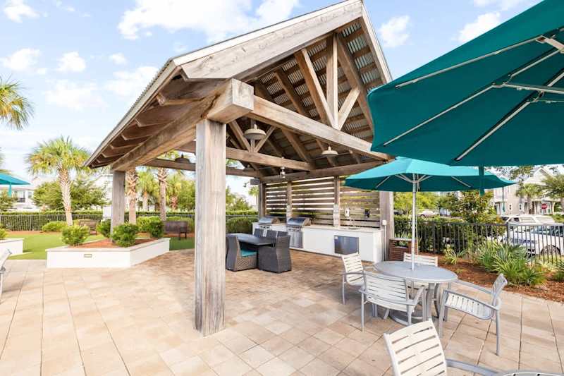 Beautiful cabana with gas grilling areas by the pool.