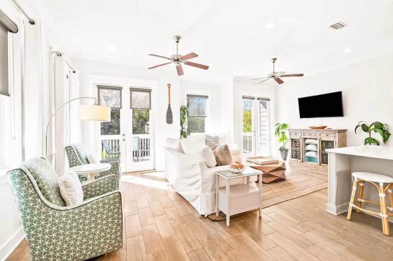 Living room features plenty of seating and a Smart TV- perfect to watch movies at night!