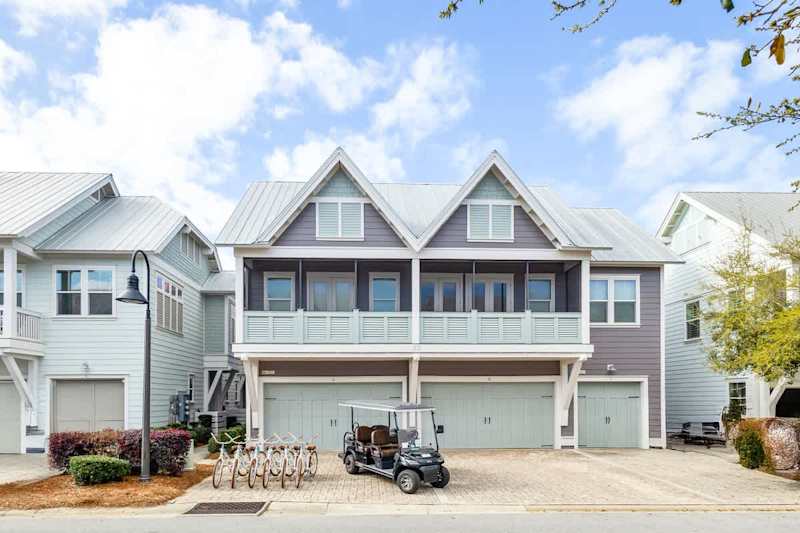 Home includes 2 driveway parking spaces in front of the left double garage door.