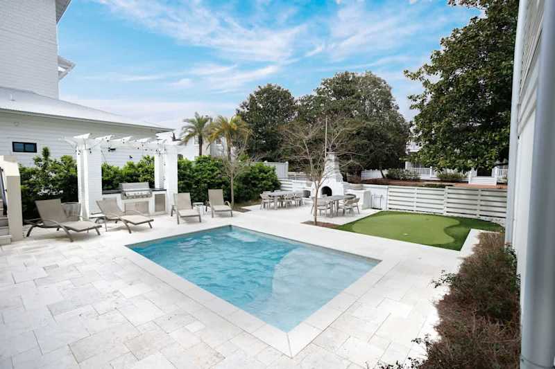 Backyard is perfect for entertaining with a heated pool!