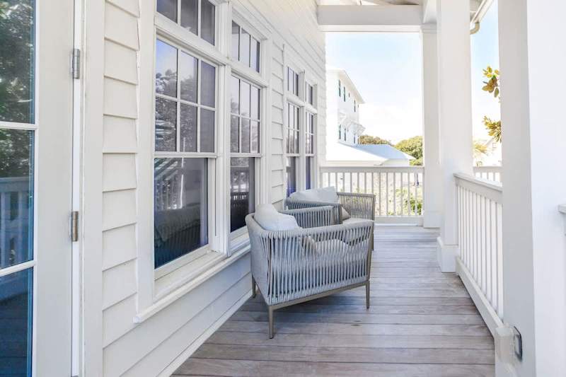 Carriage house front porch with seating to enjoy your morning coffee!