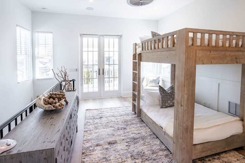 Step outside the third floor loft area to a beautiful patio space with sweeping Gulf views!