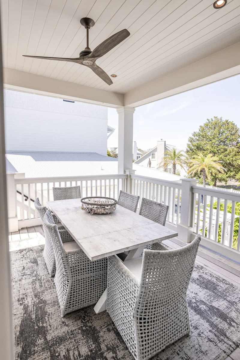 Outdoor dining area off kitchen has 6 seats.
