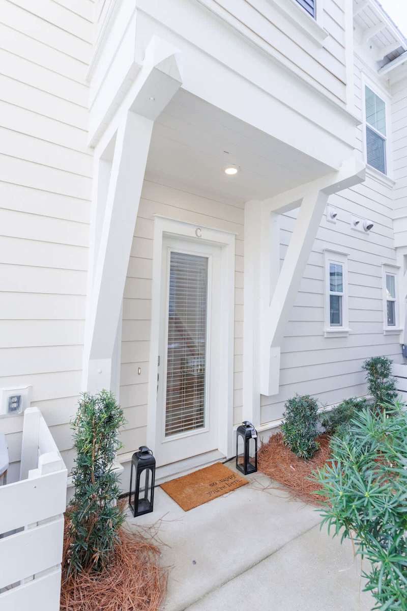 Home front door with steps up to living spaces.