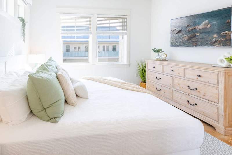 Primary bedroom features a smart TV perfect for watching movies at night!