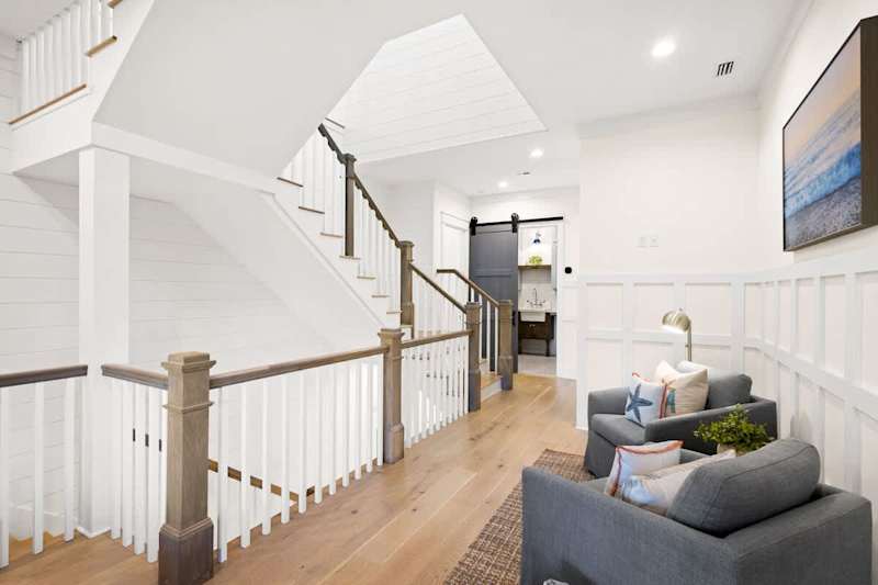 Second floor features a seating area. Perfect nook to enjoy a good book.