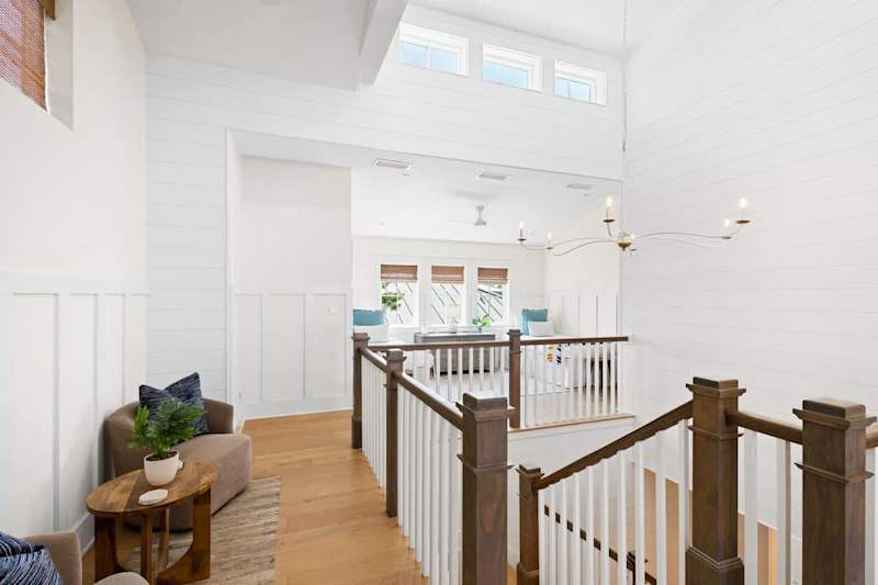 Third floor loft space features a sky light for ample natural light.