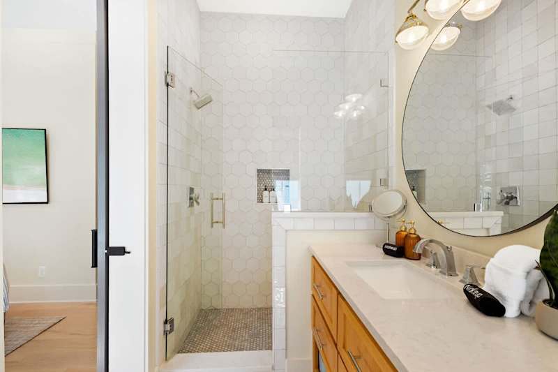 Bathroom features a walk-in shower.