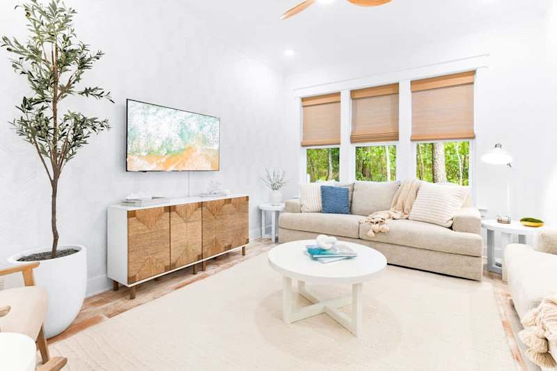 Large living room with plenty of seating for watching movies!