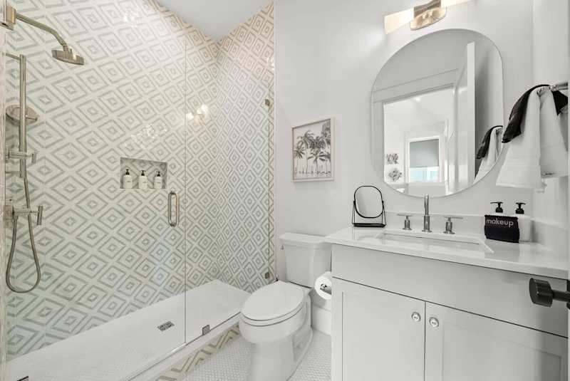 Bathroom features a walk-in shower.