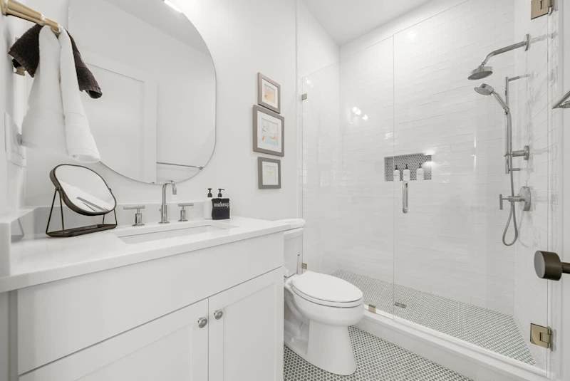 Second floor hall bathroom features a walk-in shower.