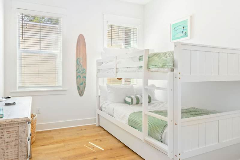 Bedroom #1 features queen over queen bunk with a twin trundle.