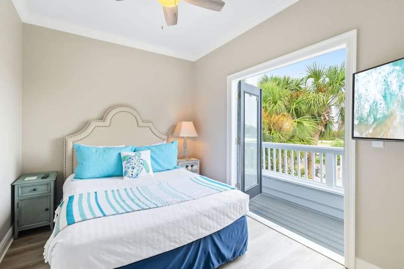 Bedroom #3 features a queen bed, smart tv and walkout balcony.