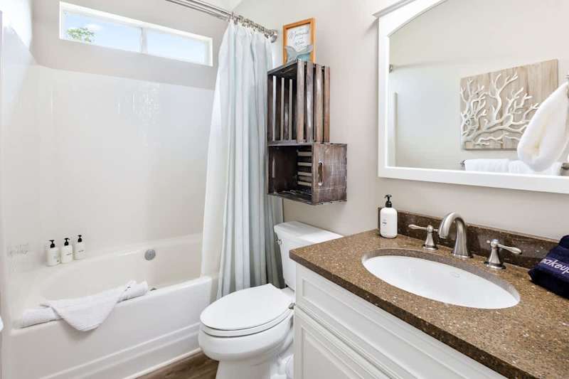 Second floor bathroom features a shower/tub combo.