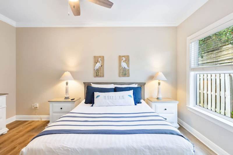 Bedroom #2 features a queen bed and smart tv.