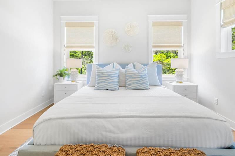 Bedroom #3 features a king bed, ensuite, and smart tv.