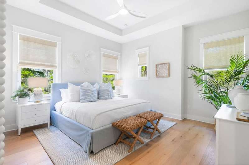 Bedroom #3 features a king bed, ensuite, and smart tv.