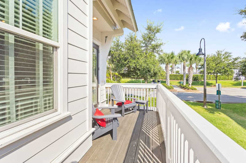 Large private patio with seating off living room.