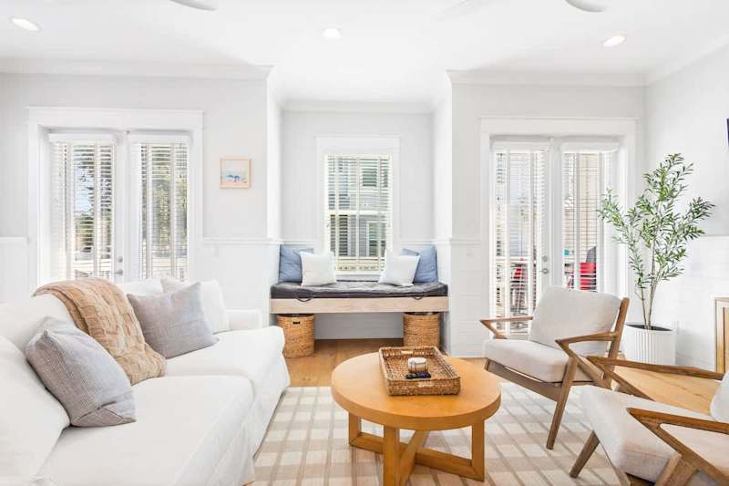 Plenty of seating in the living room space for the family.