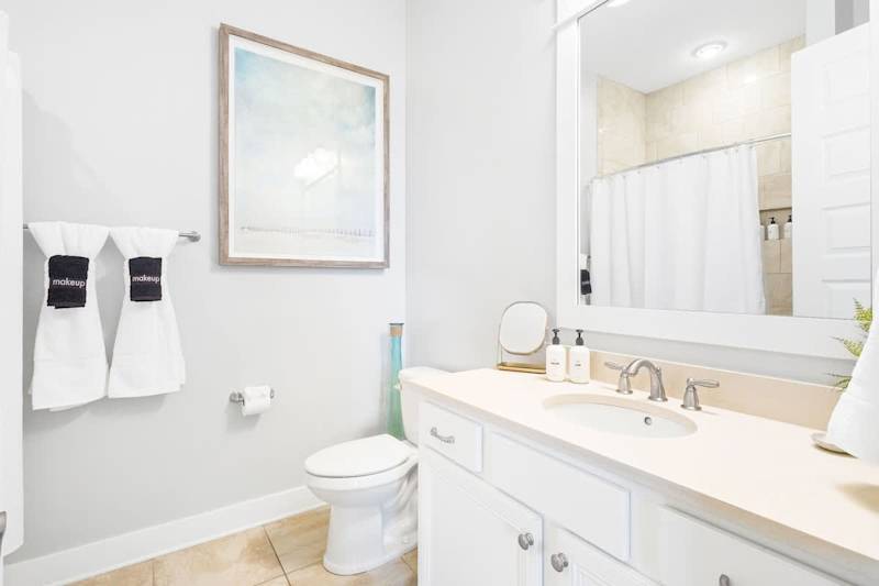 Second floor hallway bathroom features a tub/shower combo.