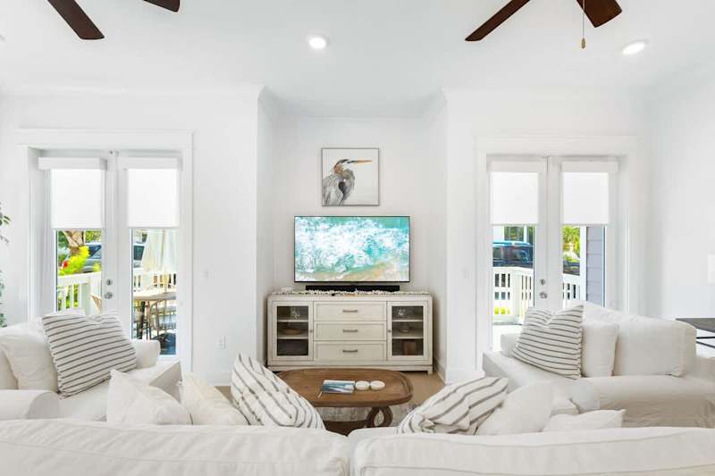 Plenty of seating in living room area to snuggle up and watch a movie at night!