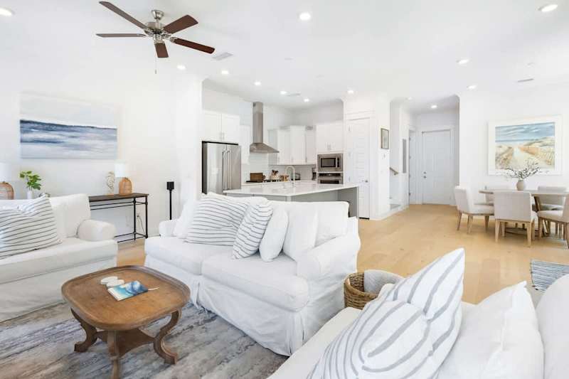 Living room features a queen sleeper sofa.