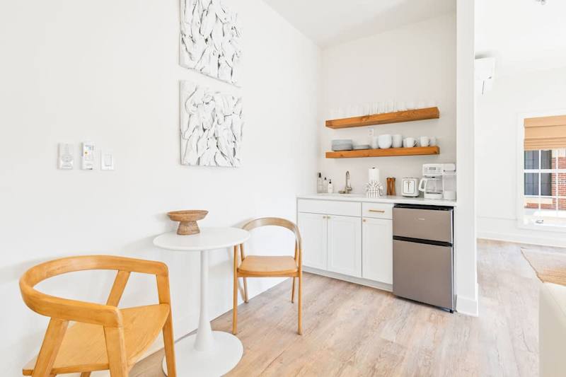 Kitchenette in condo features a toaster, Keurig/Drip coffee maker, mini fridge/freezer, and dishes!