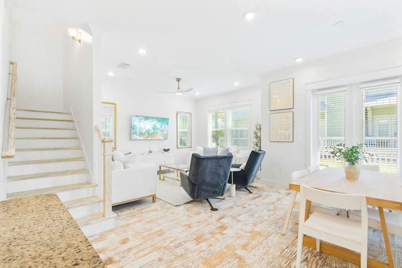 Staircase leads to second floor bedrooms.