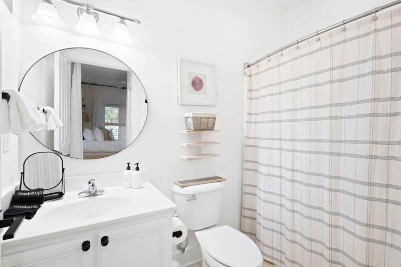 Bathroom features a shower/tun combo.