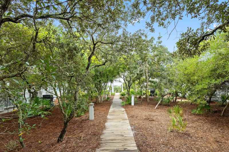 Boardwalk off back patio leads to community pool!