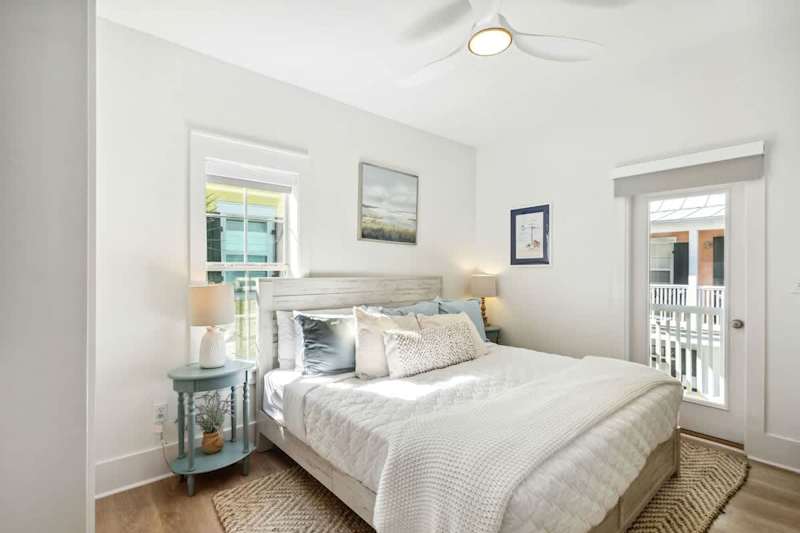 Bedroom #2 features a king bed, ensuite, smart tv and walkout to balcony.