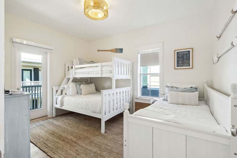 Bedroom #1 features (1) twin over full bunk and (1) twin bed, ensuite and smart tv.