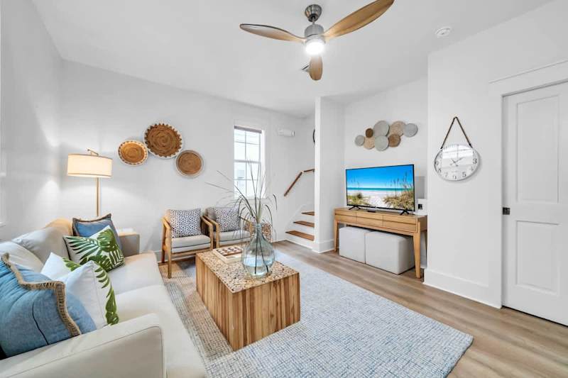Living area features a smart tv, playing cards and board games.