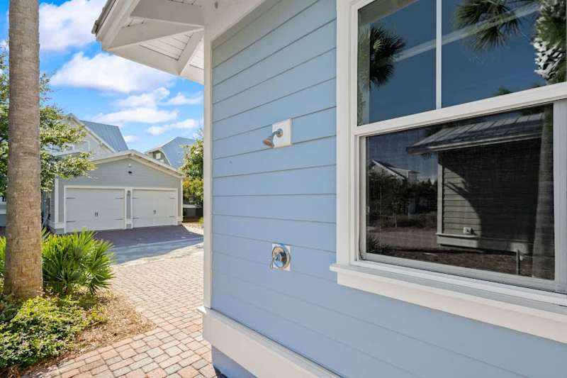 Home features an outdoor shower to rinse after a day at the beach!