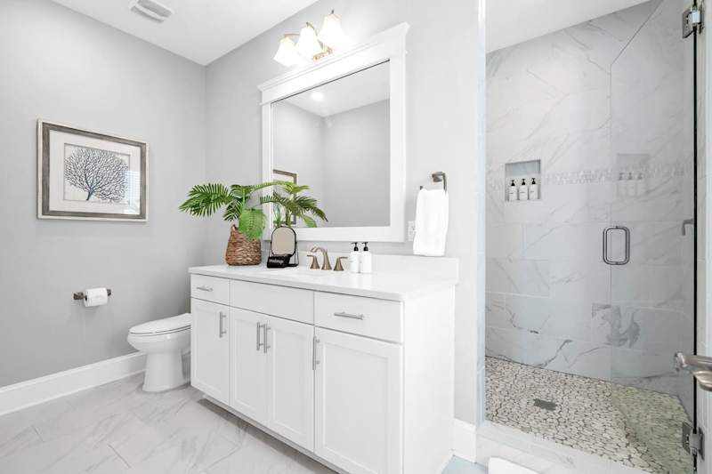 Bathroom features a walk-in shower