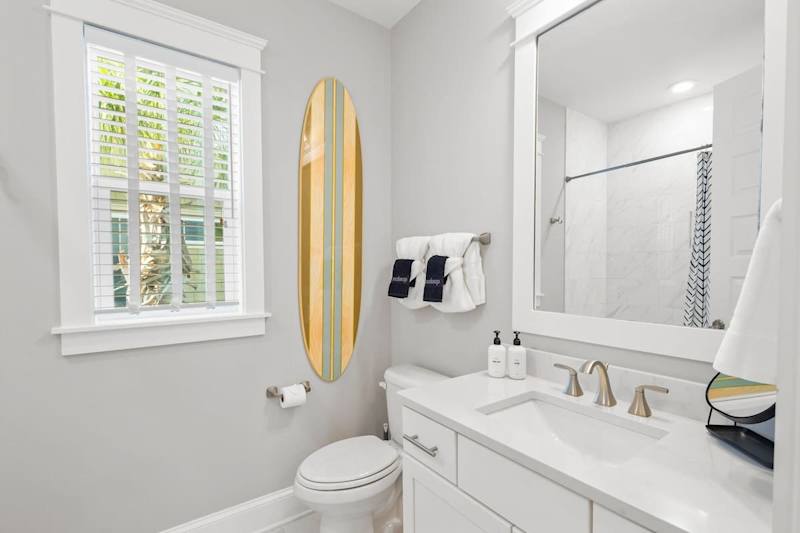 Second floor full bath featuring a shower/tub combo.