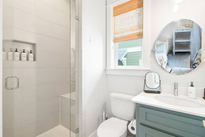 Bathroom features a walk-in shower.