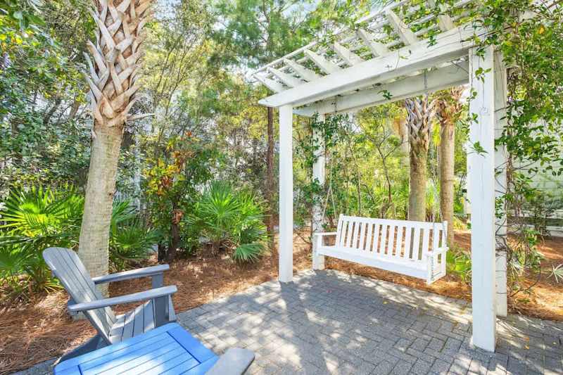 Serene backyard is the perfect place to catch up on your favorite book.