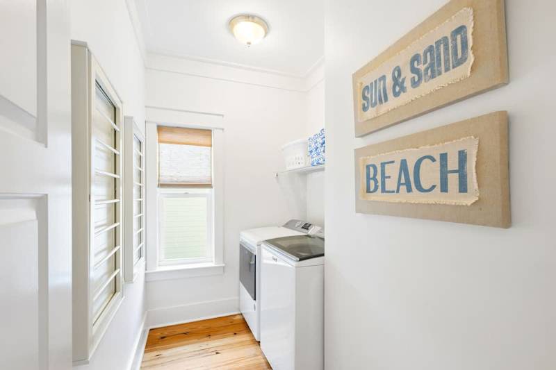 Second floor laundry features full washer and dryer.