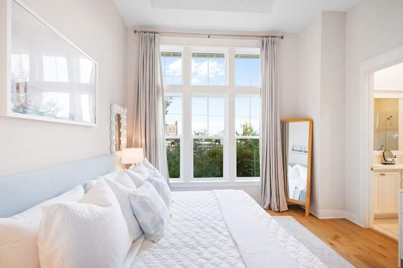 Bedroom #3 features a king bed, ensuite and smart tv.