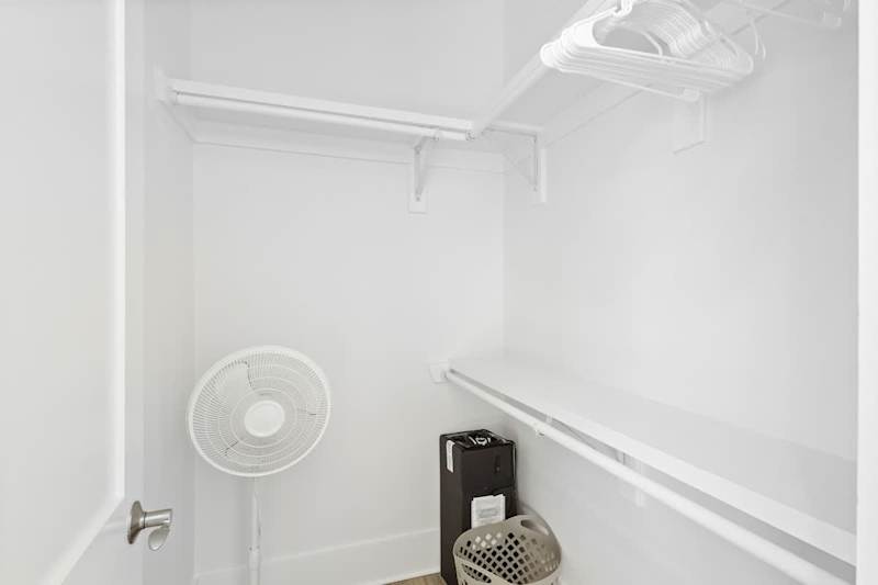 Bedroom features a walk-in closet.