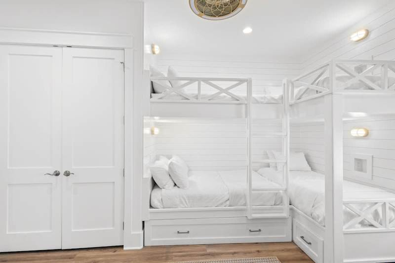 Bedroom #2 features (1) full over full bunk with a twin trundle and (1) twin over twin bunk.
