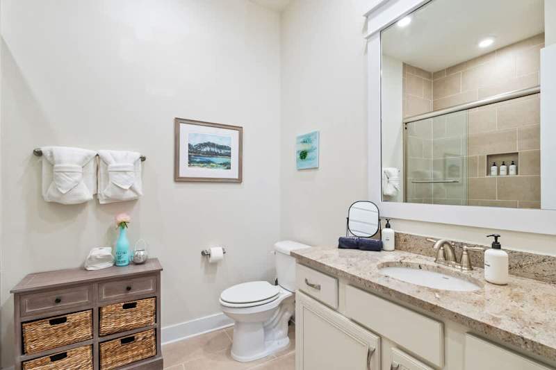 Second floor full bath features a shower/tub combo.