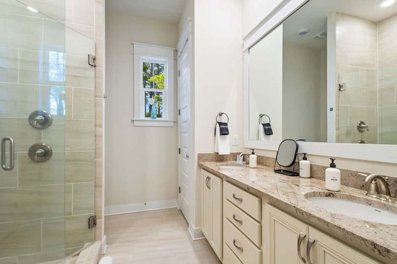 Ensuite features double vanities and a walk-in shower.