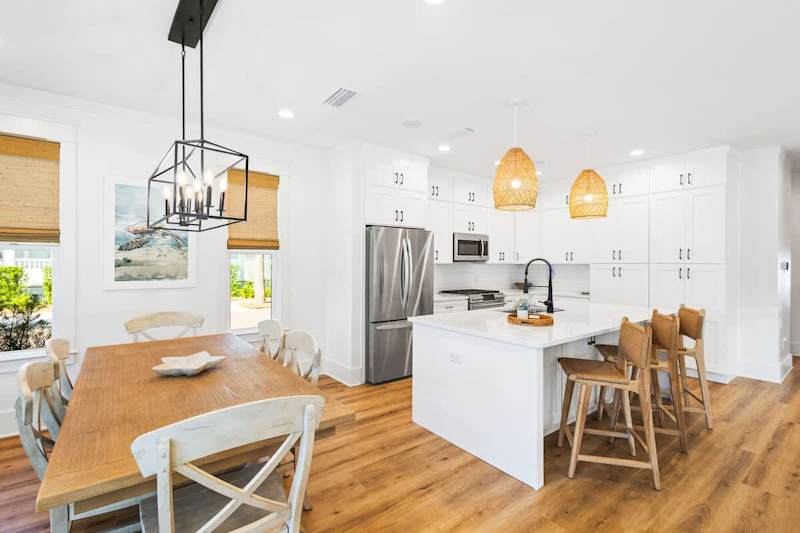 Large kitchen island features seating for 3.