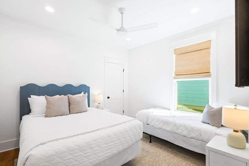Bedroom #2 features (1) queen bed, (1) twin bed, ensuite and a smart tv.
