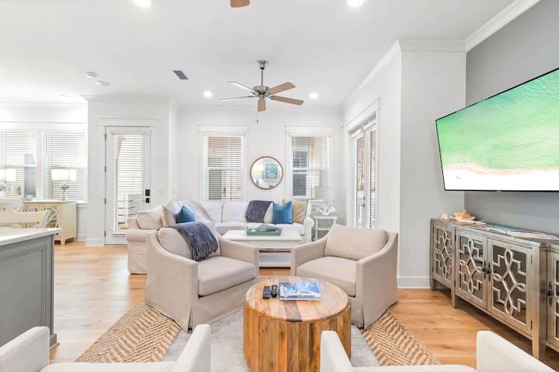 Living room features plenty of seating.
