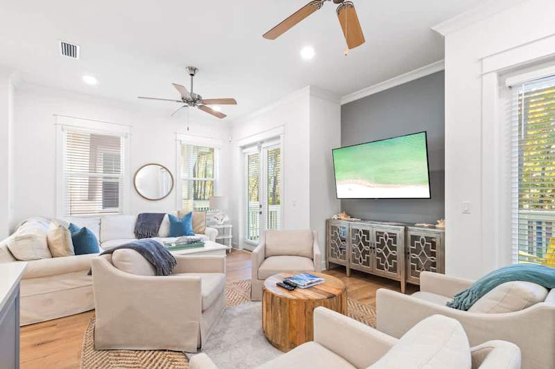 Living features a smart tv and two walkouts to your private patio.