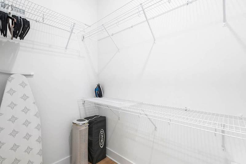 Bedroom features a large walk-in closet.